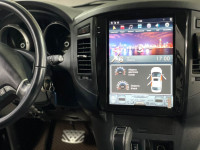 Магнитола для Mitsubishi Pajero 4 2006-2022 - Carmedia ZF-1302-GE вертикальный экран в стиле "Тесла" на Android 13, 8Гб+128Гб, CarPlay, 4G SIM-слот