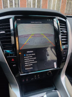 Магнитола для Mitsubishi Pajero Sport 2020+ - Carmedia ZF-1286-GE вертикальный экран в стиле "Тесла" на Android 13, 8Гб+128Гб, CarPlay, 4G SIM-слот